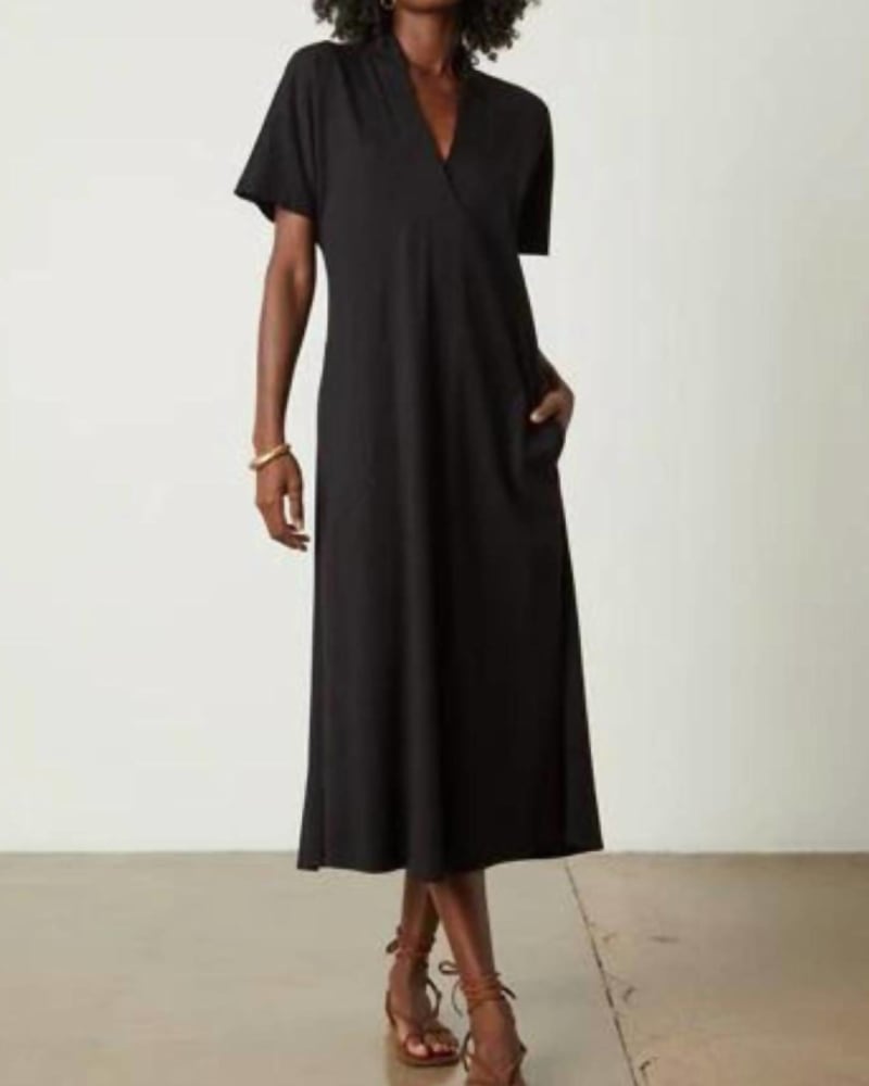 Front of a model wearing a size Large Nora Midi Dress In Black in Black by Velvet by Graham & Spencer. | dia_product_style_image_id:344813
